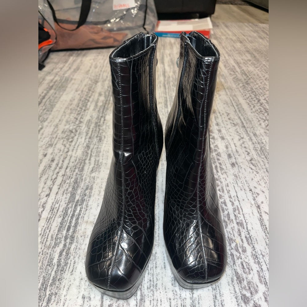 Platform snakeskin booties